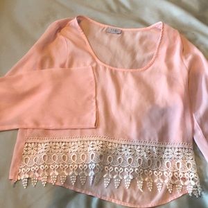 Pink crop with bell sleeves and lace detail